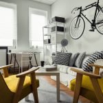 bike storage idea bicycle hanging on the wall in the living room