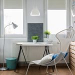 Wooden pallet used as bike storage furniture on a bright studio flat